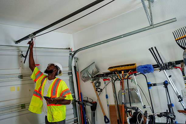 Professional Garage Door Panel Replacement technician working in Wilburton, OK